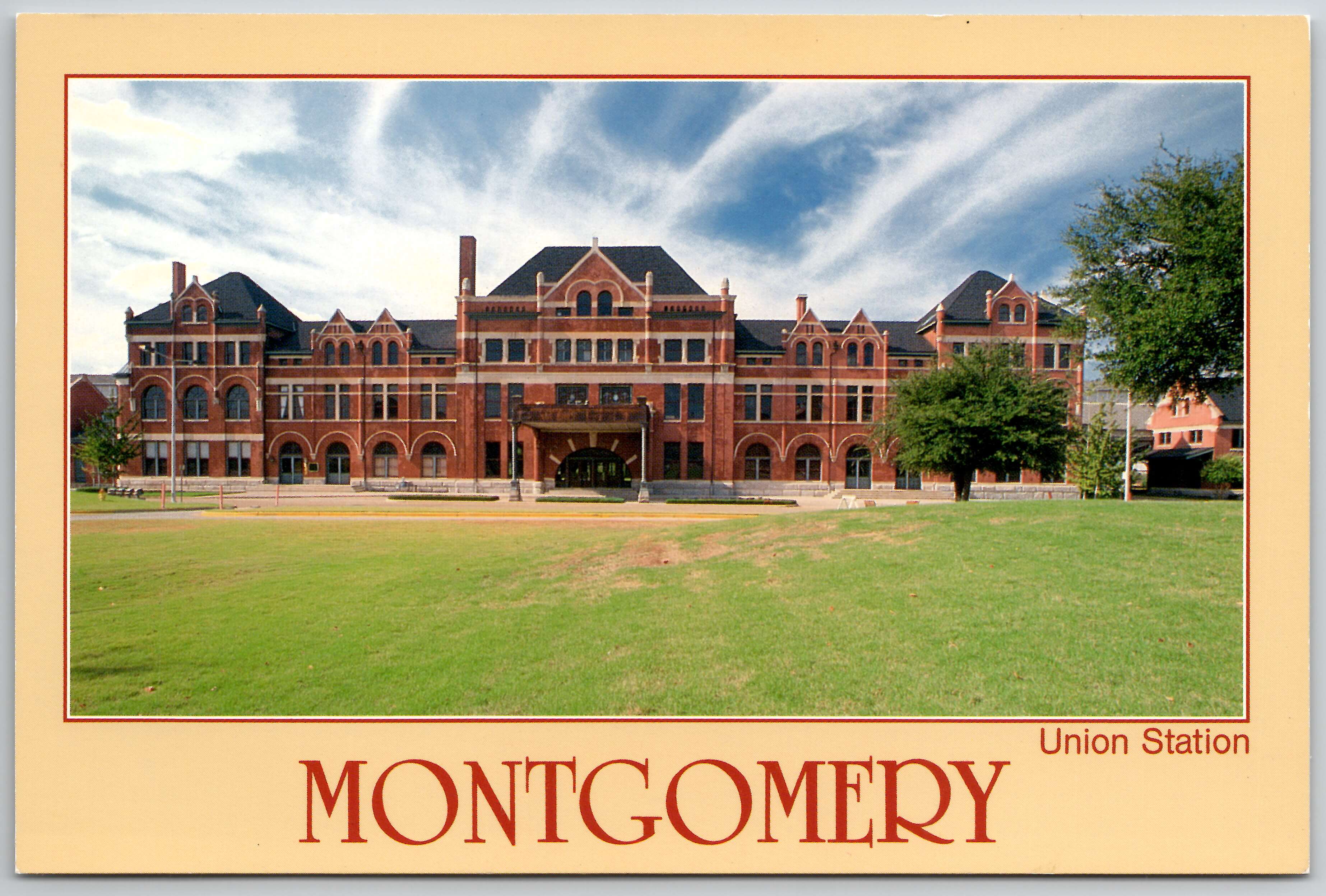 Modern chrome postcard of Montgomery Railway Depot, red brick building with arched windows and striped awnings.