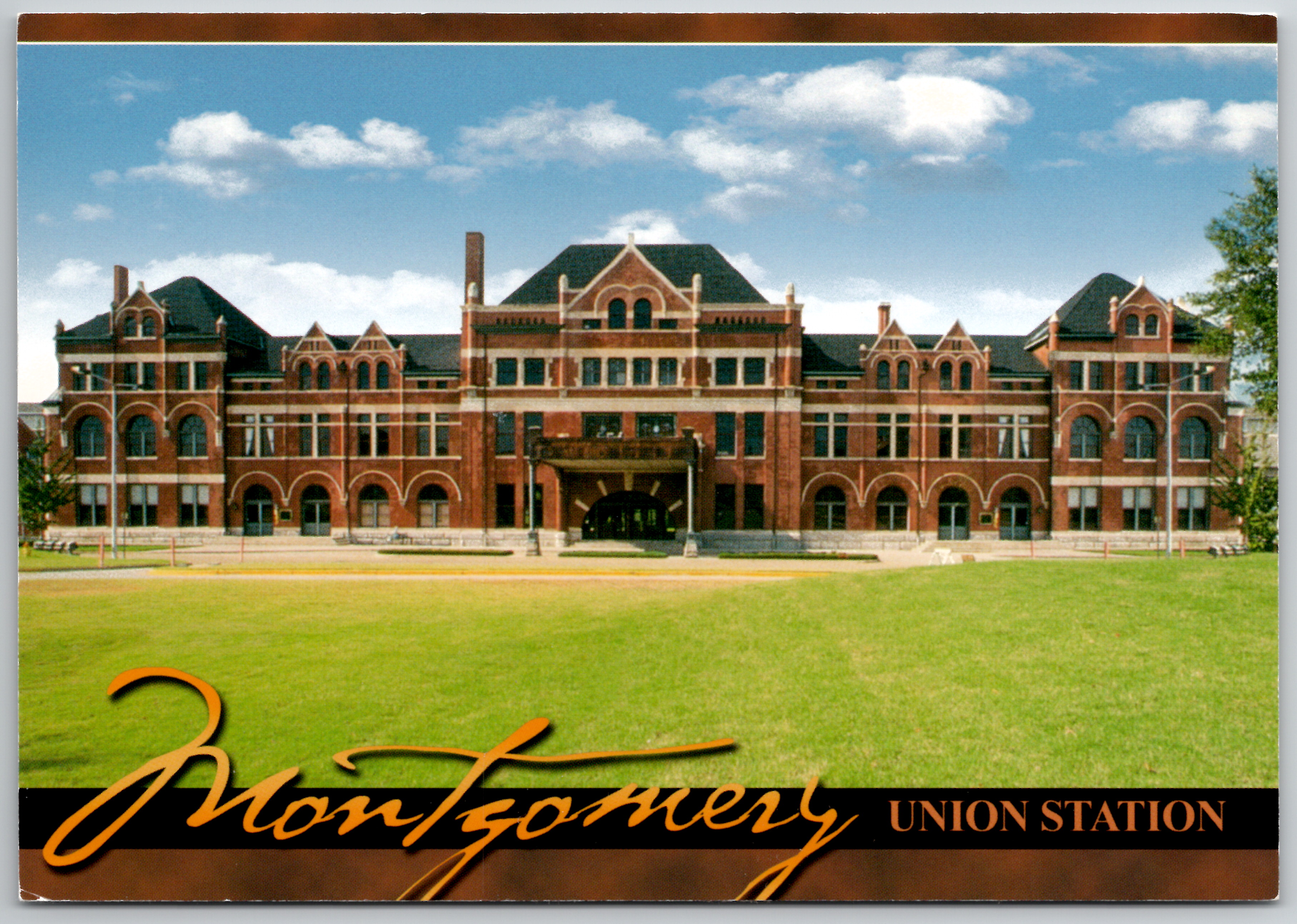 Modern chrome postcard of Montgomery Railway Depot, red brick building with arched windows and striped awnings.