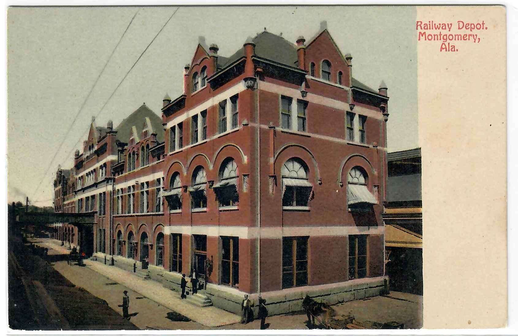 Color postcard of Montgomery Railway Depot, red brick building with arched windows and striped awnings.